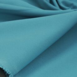 Turkizna kostimska tkanina - elastična, s svilenim otipom