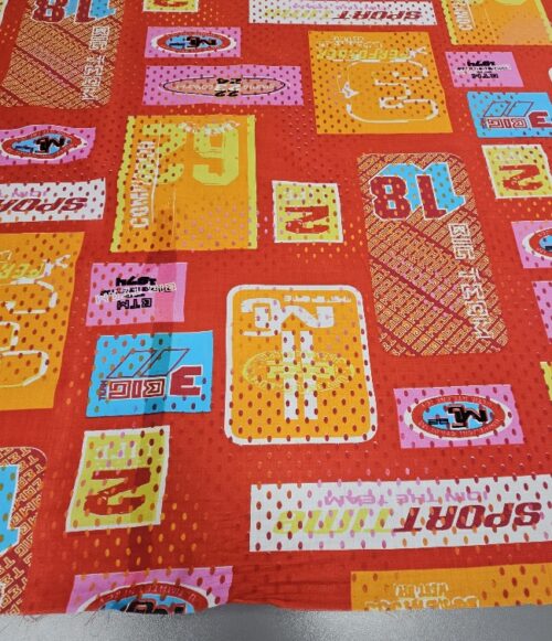 Bombažni poplin s šprtnim pop-art potiskom