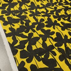 Rumeno-črna bombažno-lanena mešanica s črnim listnim vzorcem